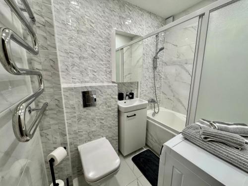 Koupelna v ubytování Cozy Baltic Apartment