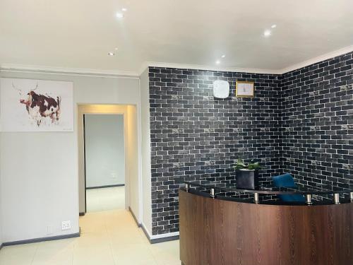 Η κουζίνα ή μικρή κουζίνα στο Annika guest house Claremont