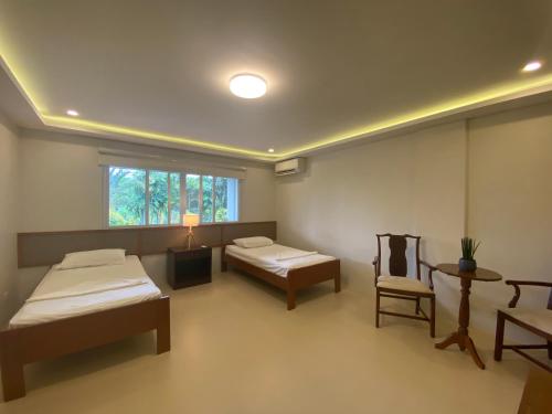 Ένα ή περισσότερα κρεβάτια σε δωμάτιο στο Casa Las Brisas