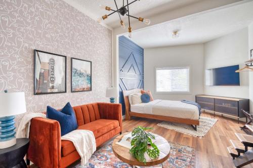 a living room with a couch and a bed at Stay Portland - Bright Brooklyn Studio in Portland