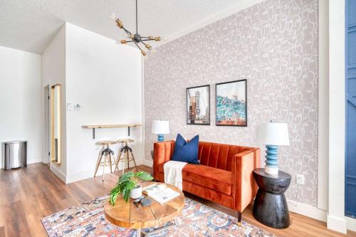a living room with a couch and a table at Stay Portland - Bright Brooklyn Studio in Portland