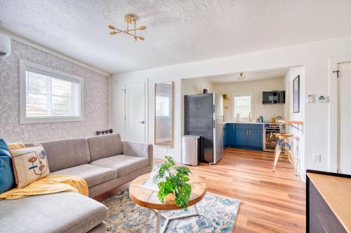 a living room with a couch and a table at Stay Portland - Brooklyn 1 Bedroom Stylish Suite in Portland