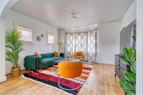 a living room with a couch and a table at Stay Portland - Lively 2BR Old Hollywood Apt - 92 WalkScore in Marquam Hill
