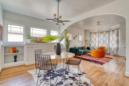 a living room with a table and chairs at Stay Portland - Lively 2BR Old Hollywood Apt - 92 WalkScore in Marquam Hill