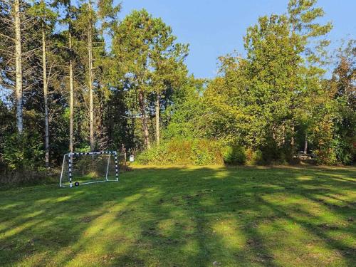 a field with a goal in the middle of a yard at Family-friendly Oasis - By Traum Ferienwohnungen in Øster Melholt