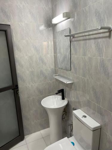 Vannituba majutusasutuses Résidence Pietri