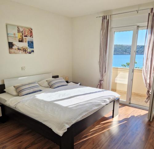Apartments by the sea Barbat, Rab - 11797