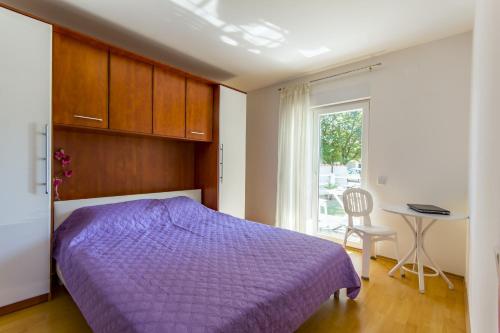 Postel nebo postele na pokoji v ubytování Apartments with parking space Valbandon, Fazana - 16261