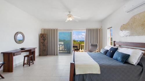 Postel nebo postele na pokoji v ubytování villa kiki