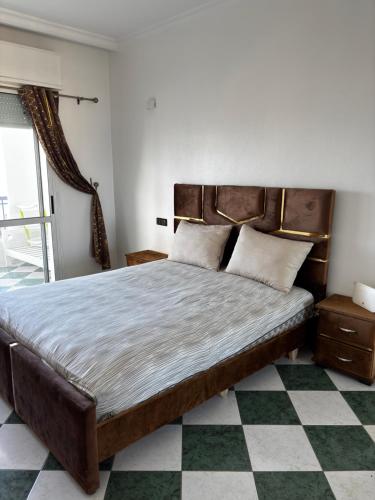 Ένα ή περισσότερα κρεβάτια σε δωμάτιο στο Juli sty Brisa del Mar