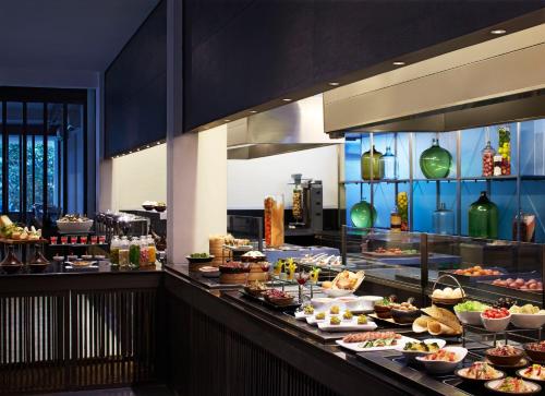 a buffet line with many different types of food at Jetwing Blue in Negombo