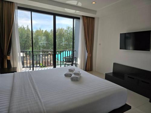 Ліжко або ліжка в номері Sun Marina Cha-Am