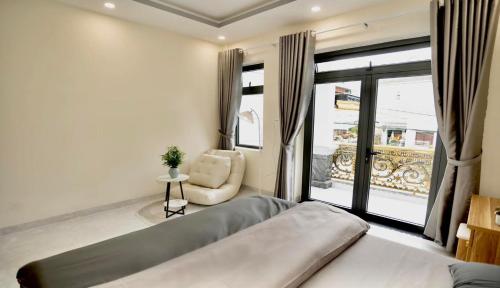 Postel nebo postele na pokoji v ubytování Amy Hotel & Apartment