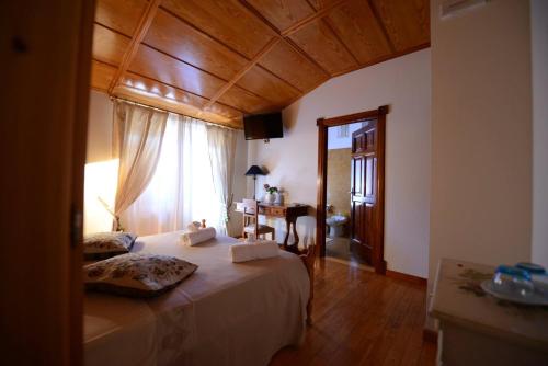 Katil atau katil-katil dalam bilik di Villa Montegenco