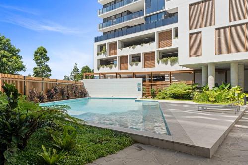 The swimming pool at or close to The Corso - Luxe Stay in Maroochydore CBD