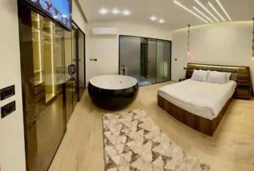 Ένα ή περισσότερα κρεβάτια σε δωμάτιο στο mkoooo otl