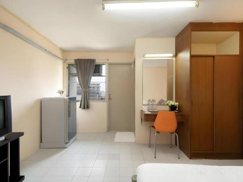 O bucătărie sau chicinetă la SURANG MANSION