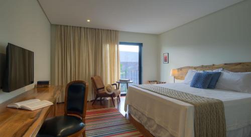 Ένα ή περισσότερα κρεβάτια σε δωμάτιο στο Hotel Villa Amazônia