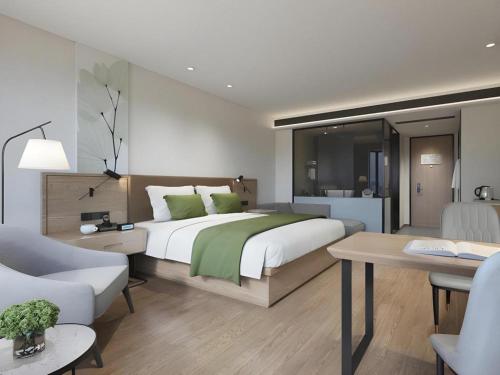 Postel nebo postele na pokoji v ubytování Green Tree Inn Beijing Daxing District Jiugong Hospital