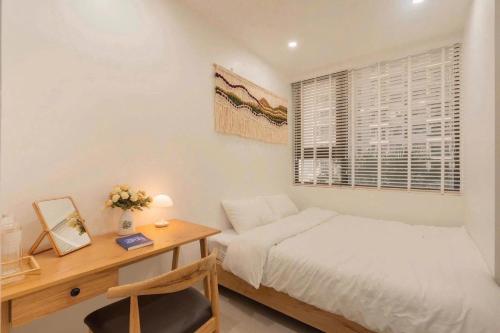 Cama o camas de una habitación en Minh Anh Apartment 2