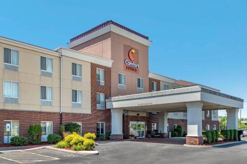 a rendering of a hotel building with a parking lot at Comfort Suites Urbana Champaign, University Area in Champaign