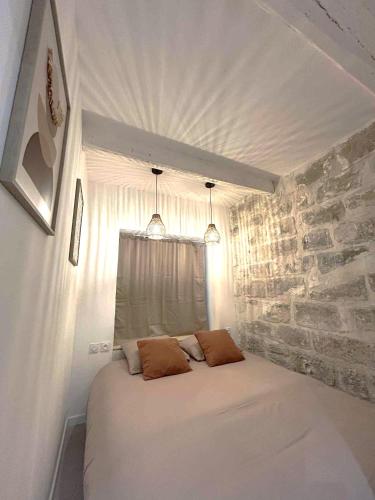 Llit o llits en una habitació de La Bohème
