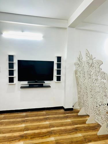 Et tv og/eller underholdning på Ujjain home stay