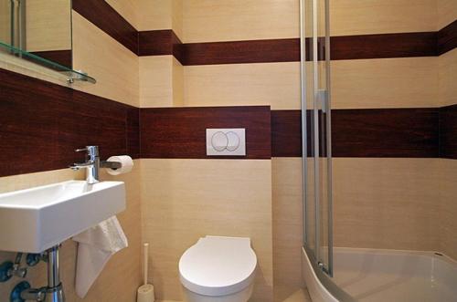 Koupelna v ubytování Apartamenty Tęcza