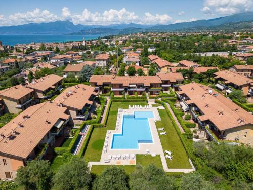 an aerial view of a house with a swimming pool at Amazing holiday home in Lazise with swimming pool in Lazise