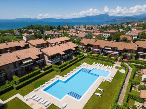 an aerial view of a house with a swimming pool at Amazing holiday home in Lazise with swimming pool in Lazise