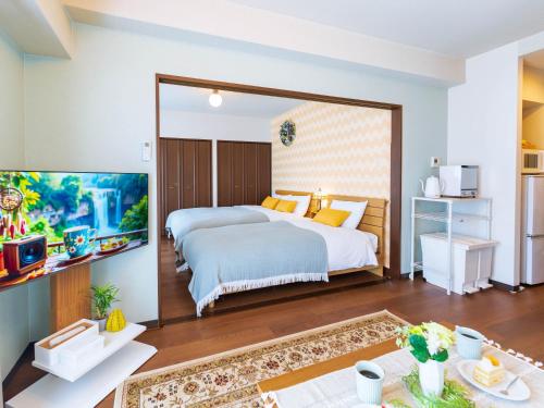 Ένα ή περισσότερα κρεβάτια σε δωμάτιο στο NicoRoom601-Convenient location