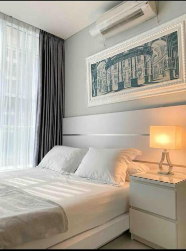 Ένα ή περισσότερα κρεβάτια σε δωμάτιο στο One Bed Room Aprtemen Alam Sutera