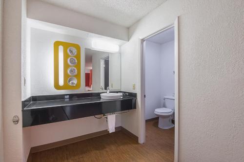 a bathroom with a sink and a toilet at Motel 6-Boerne, TX in Boerne