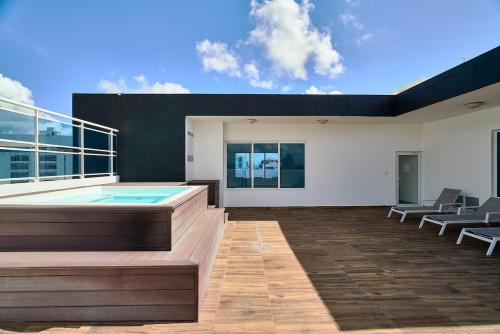 a large room with a hot tub on a building at ®{LUX~City~Skyline} @DowntownSD PrivéJaccuziGym in La Julia