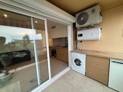 Kuchyň nebo kuchyňský kout v ubytování Apartaments Wasela 104
