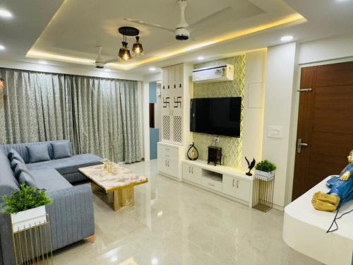 TV a/nebo společenská místnost v ubytování Urban Central