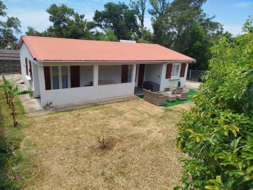 Κήπος έξω από το La maison aux bananiers