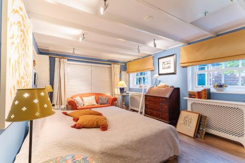 Postel nebo postele na pokoji v ubytování Vrijvakantiehuis het SpaarPotje Veere