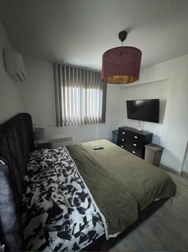 Ένα ή περισσότερα κρεβάτια σε δωμάτιο στο Lovely spacious two bedroom apartment central