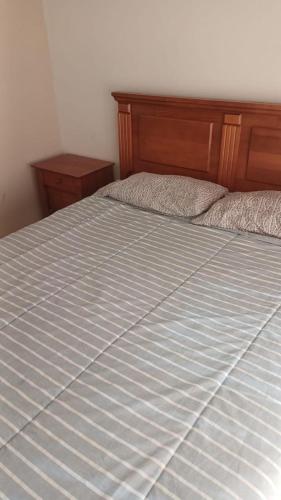 Una cama o camas en una habitación de Retamilla 409