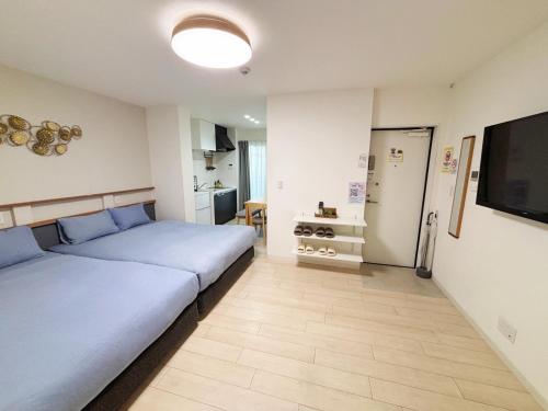 Posezení v ubytování 櫻時雨-新大阪民泊