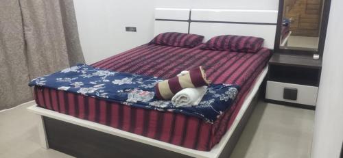 Ένα ή περισσότερα κρεβάτια σε δωμάτιο στο Cloud Stay