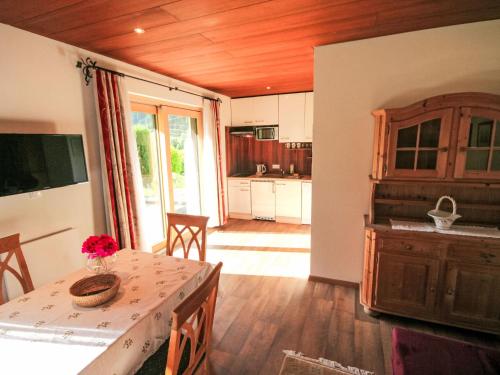 a kitchen with a table and a dining room at Apartment Studio Grenta by Interhome in Gortipohl