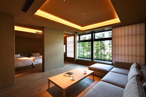 Postel nebo postele na pokoji v ubytování つる幸