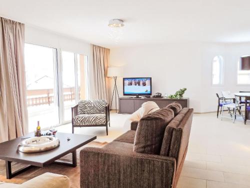 Μια τηλεόραση ή/και κέντρο ψυχαγωγίας στο Apartment A11 by Interhome