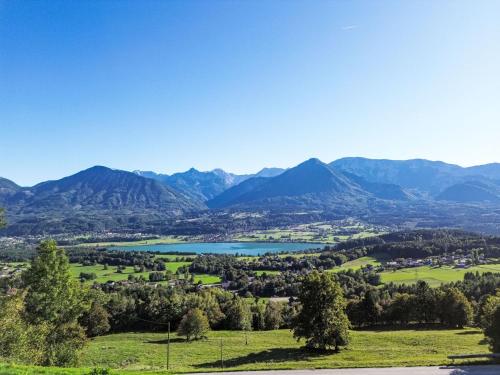 a view of a valley with a lake and mountains at Apartment Hochstuhlblick by Interhome in Pugrad