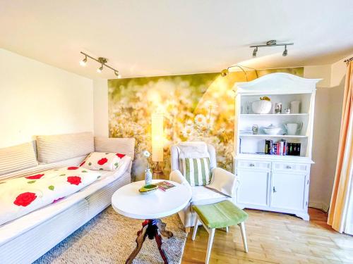 a living room with a couch and a table at Apartment Bärbel by Interhome in Suhl