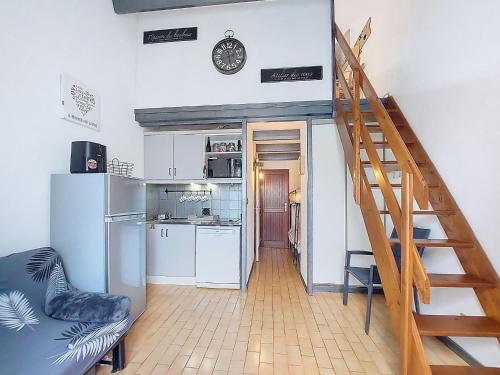 Kuchyň nebo kuchyňský kout v ubytování Holiday Home Les Charmilles-15 by Interhome