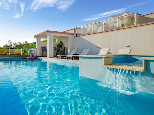 Kolam renang di atau dekat dengan Apartment Melandura-5 by Interhome