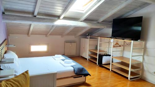 Ένα ή περισσότερα κρεβάτια σε δωμάτιο στο Verona Dreams